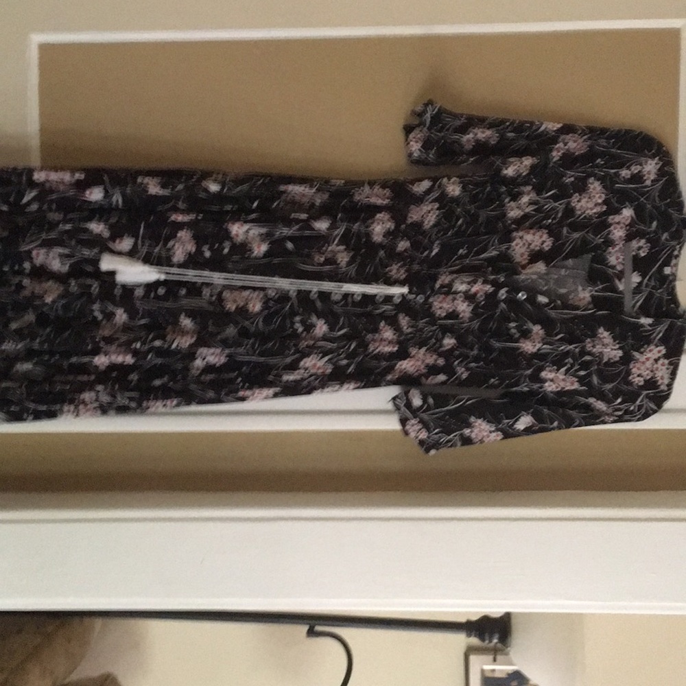 New long feminine lovely tiny print never worn.